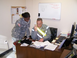 SFC Trail, working an issue with the company supply sergeant, Specialist Breland.